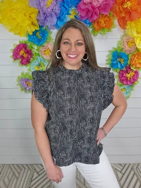 BLACK IRREGULAR DOT PRINT TOP WITH A FRILL MOCK NECKLINE